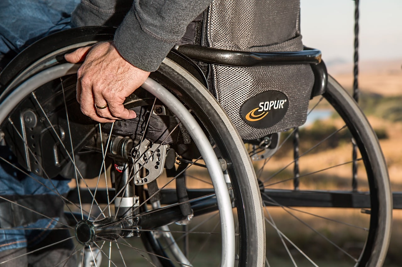 Person in a wheelchair. Close up shot.
